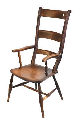 Lot 560 - Elm and fruitwood bar- back chair