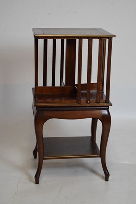 Lot 394 - Edwardian brass inlaid revolving bookstand