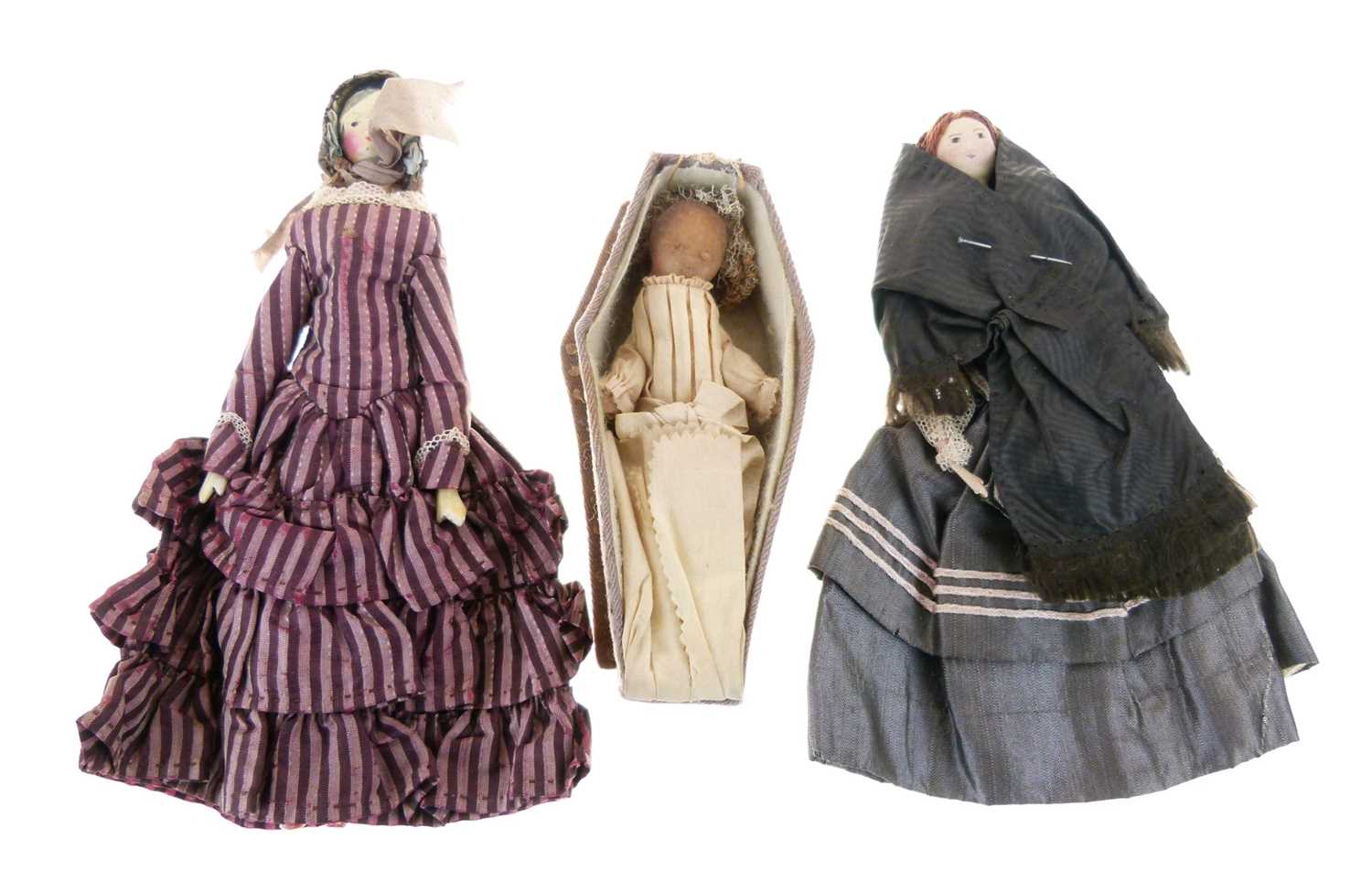 Lot 260 - Wooden peg doll, cloth doll, and coffin doll