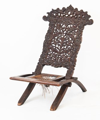 Lot 485 - Indian carved hardwood folding chair circa 1900