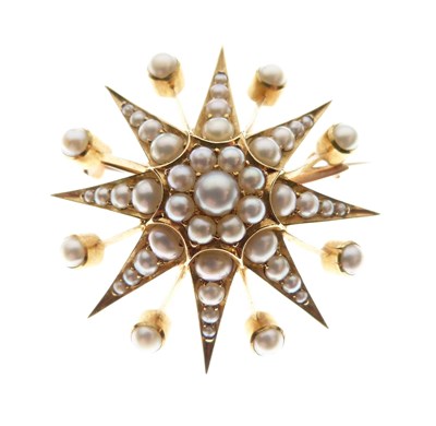 Lot 37 - Seed pearl starburst brooch
