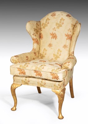 Lot 581 - Early 20th Century giltwood wing armchair