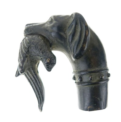 Lot 141 - Cast bronze walking stick or cane handle, dog with pheasant