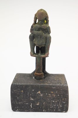 Lot 142 - Cast bronze pipe tamper of a woman