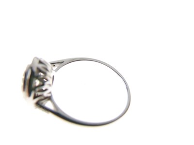 Lot 4 - Diamond and calibré emerald ring