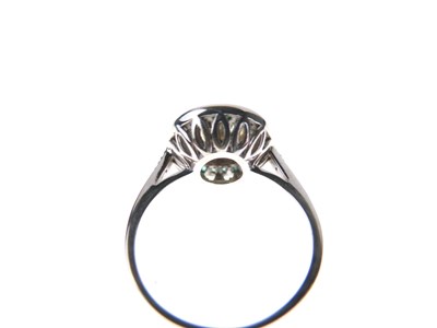 Lot 4 - Diamond and calibré emerald ring