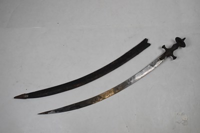Lot 281 - An Indian sword 'Tulwar', with a single edged curved 30" blade