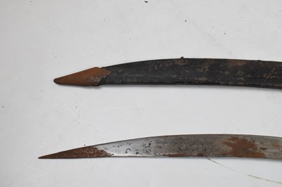 Lot 281 - An Indian sword 'Tulwar', with a single edged curved 30" blade