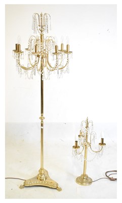 Lot 649 - Modern brass standard lamp, candelabrum and table light
