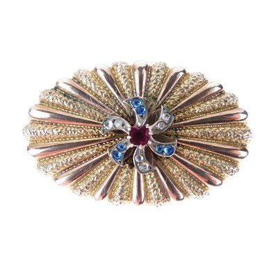 Lot 39 - An unusual silver gilt mechanical brooch, circa 1900
