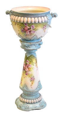 Lot 478 - Floral pottery jardiniere and stand