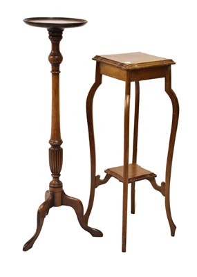Lot 584 - Two small torcheres or plant stands