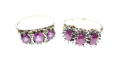 Lot 13 - Two ruby three-stone rings