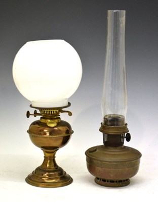 Lot 586 - Two oil lamps, shades etc