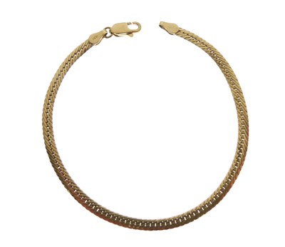 Lot 78 - Yellow metal flexible bracelet stamped '750'