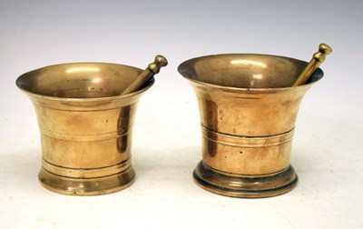 Lot 587 - Two bellmetal mortars and pestles