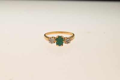 Lot 6 - 18ct gold, emerald and diamond three-stone ring