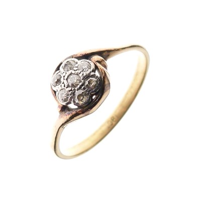 Lot 5 - Yellow metal (18ct), platinum and seven-stone diamond cluster ring