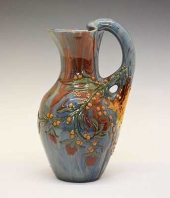 Lot 455 - Elton ware jug with slip ware and lustre finish