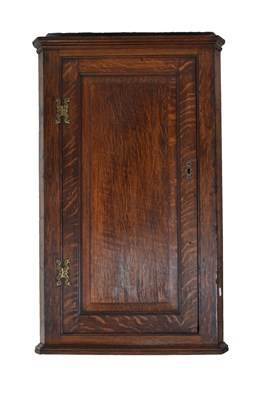 Lot 713 - Oak corner cupboard