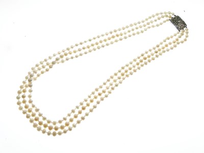 Lot 311 - Three-row freshwater pearl necklace