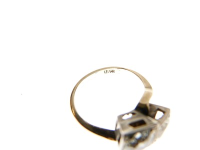 Lot 275 - Two-stone diamond crossover ring