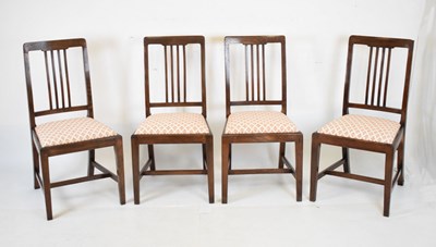 Lot 779 - Set of four early 20th Century oak dining chairs