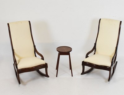 Lot 780 - Two rocking chairs and an occasional table