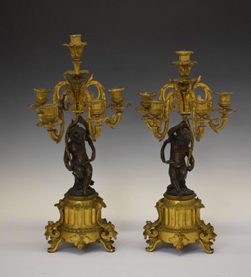Lot 421 - Pair mid 19th Century French patinated bronze and ormolu figural candlesticks