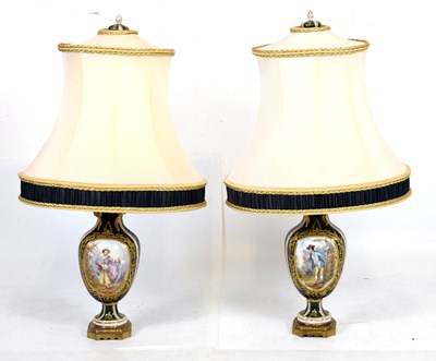 Lot 463 - Pair of early 20th Century porcelain lamps