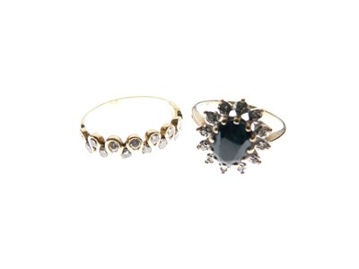 Lot 8 - 9ct sapphire and diamond set ring