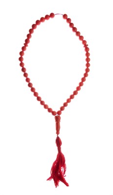 Lot 309 - Row of coral worry beads