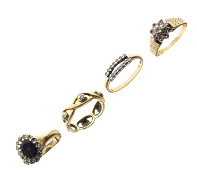 Lot 22 - Four various gold and yellow metal stone set rings