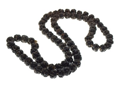 Lot 57 - Carved betel nut necklace