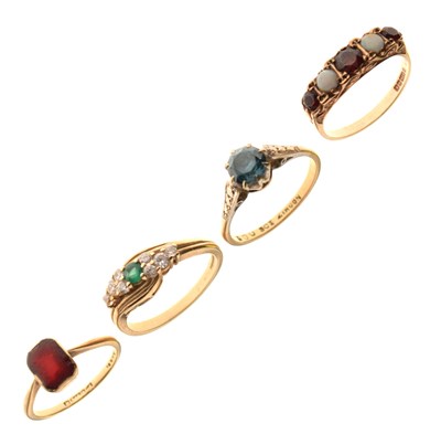 Lot 21 - Four 9ct gold stone set dress rings
