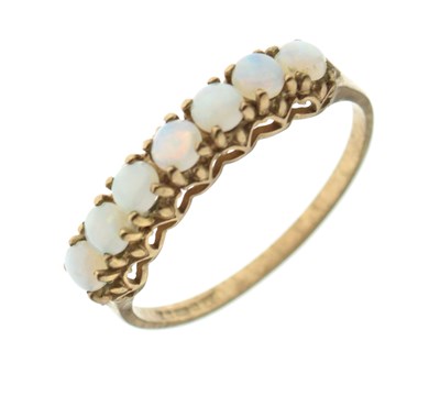 Lot 19 - 9ct gold seven stone opal ring
