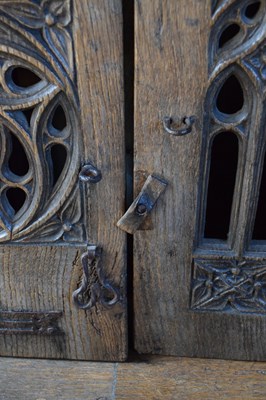 Lot 11 - Boarded oak mural livery cupboard