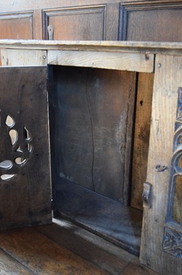 Lot 11 - Boarded oak mural livery cupboard