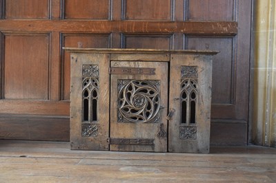 Lot 11 - Boarded oak mural livery cupboard
