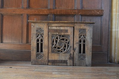 Lot 11 - Boarded oak mural livery cupboard
