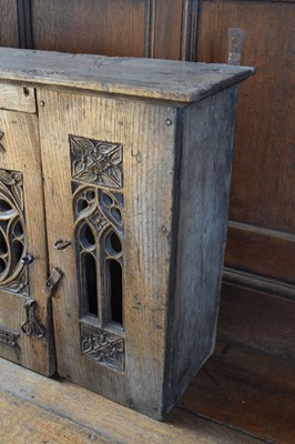 Lot 11 - Boarded oak mural livery cupboard
