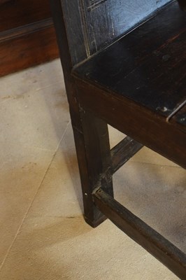 Lot 20 - Charles II oak panel-back open armchair