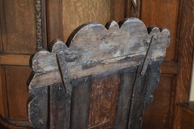 Lot 20 - Charles II oak panel-back open armchair