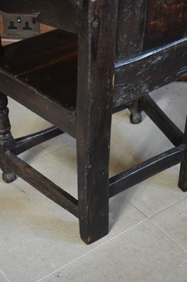 Lot 20 - Charles II oak panel-back open armchair