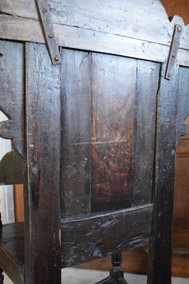 Lot 20 - Charles II oak panel-back open armchair