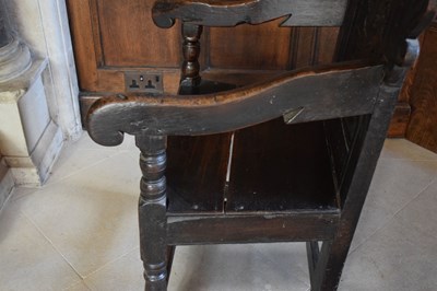 Lot 20 - Charles II oak panel-back open armchair