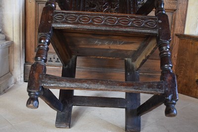 Lot 20 - Charles II oak panel-back open armchair