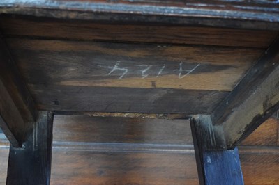 Lot 20 - Charles II oak panel-back open armchair