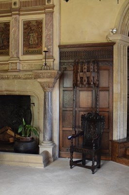 Lot 20 - Charles II oak panel-back open armchair