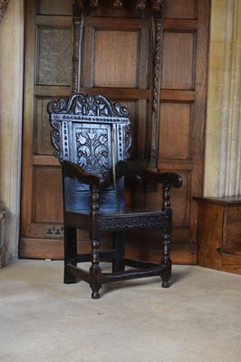 Lot 20 - Charles II oak panel-back open armchair